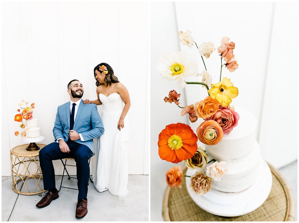 White modern wedding cake with orange, yellow, pink, and coral blooms